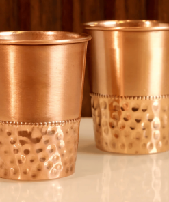 Enjoy the benefits of traditional wellness with our Handcrafted Hammered Copper Glass. Made from pure copper, this elegant tumbler enhances water quality while adding rustic charm to your everyday hydration.